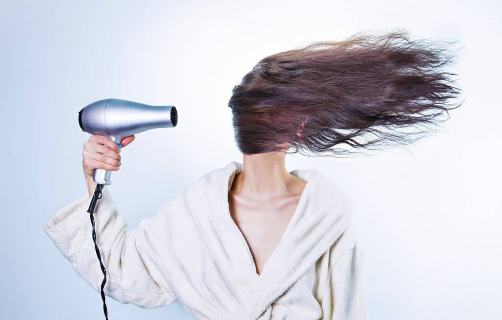 blow dry your hair 