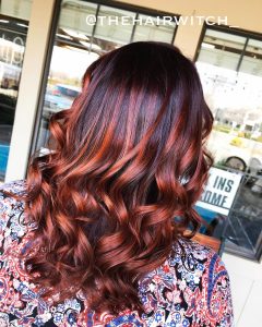 dark brown hair with copper highlights